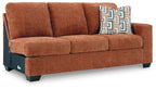 Rust orange RAF sofa with tufted back cushions and three seat cushions