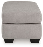 Light gray flannel ottoman, padded top and front panel with dark block legs