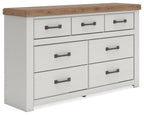 White dresser with wood top and six drawers, dark bar pulls