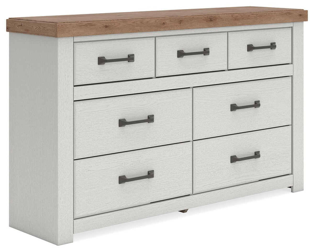 White dresser with wood top and six drawers, dark bar pulls