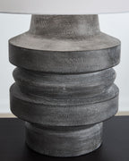Distressed black poly table lamp base, stacked ridges and weathered finish
