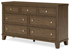 Medium brown wood dresser front view with nine drawers and silver knob hardware