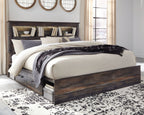 Panel bookcase bed with under-drawer storage, dark wood frame, layered bedding and throw