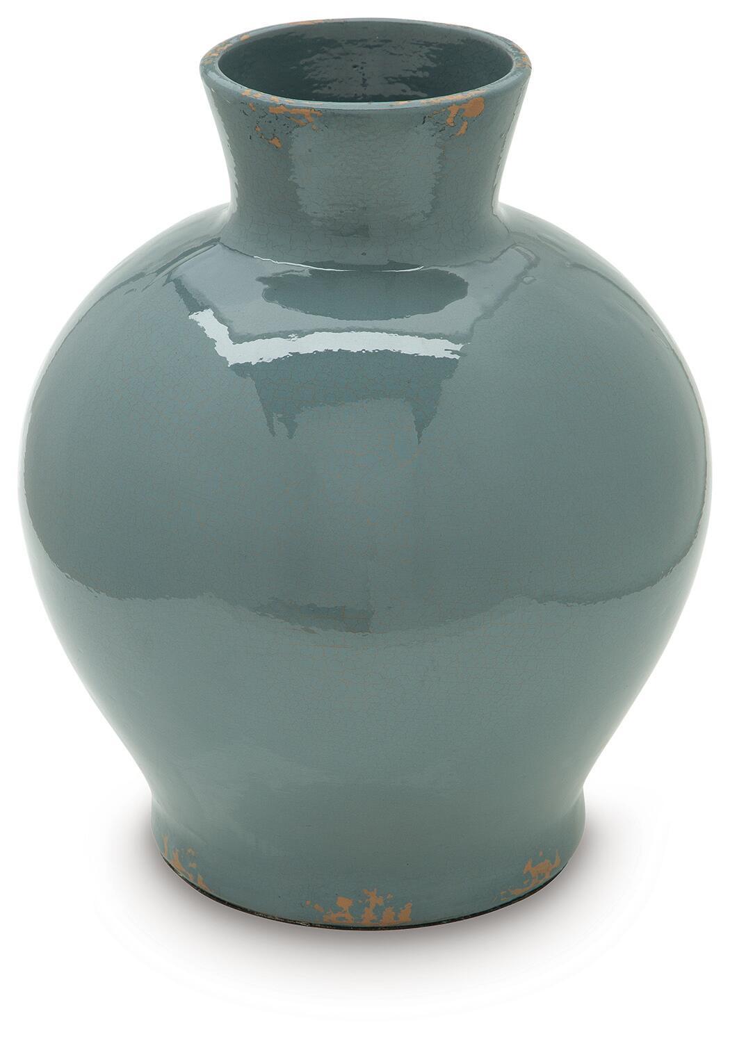 Blue ceramic vase with glossy finish, rounded silhouette, and orange speckled base accents