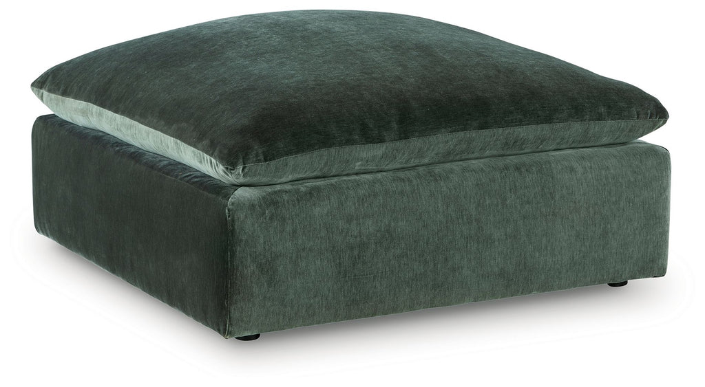 Jade green upholstered ottoman with square base and domed seat cushion