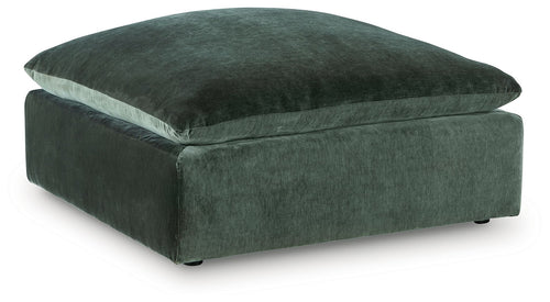 Jade green upholstered ottoman with square base and domed seat cushion