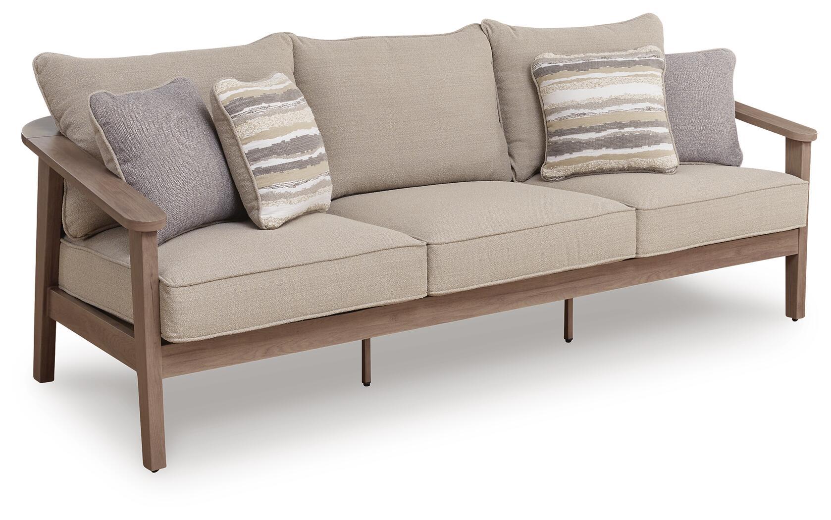 Gray fabric sofa with 2 back cushions, 2 striped throw pillows, and arm cushions