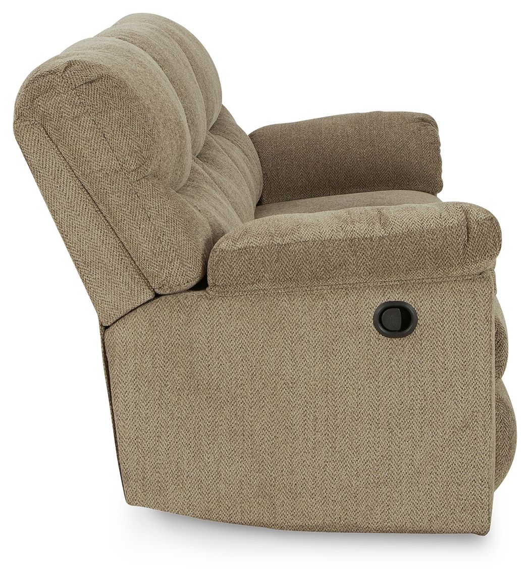 Taupe fabric recliner chair with rounded arms and circular control detail