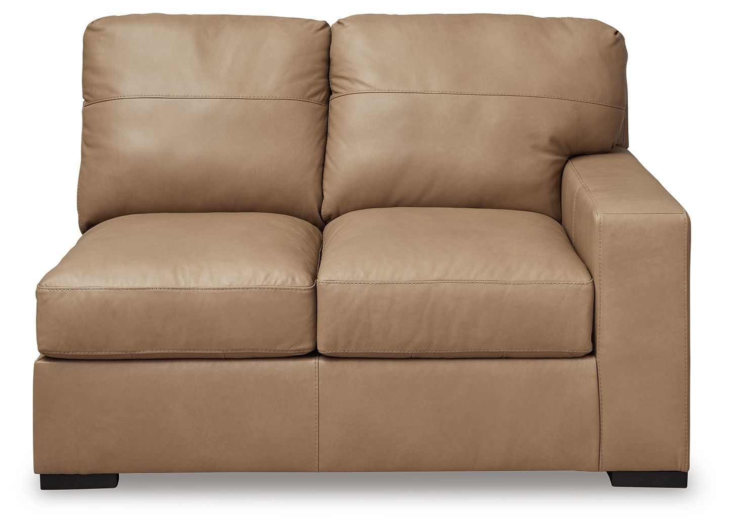 Toffee-brown leather loveseat with two front seat cushions, wide arms, and back pillows