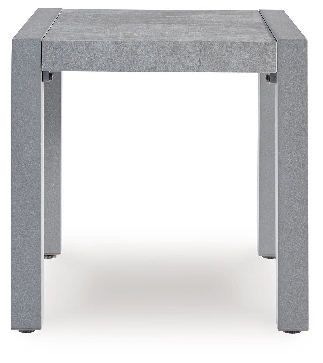 Gray square table with stone-look top and open underside framed by four legs