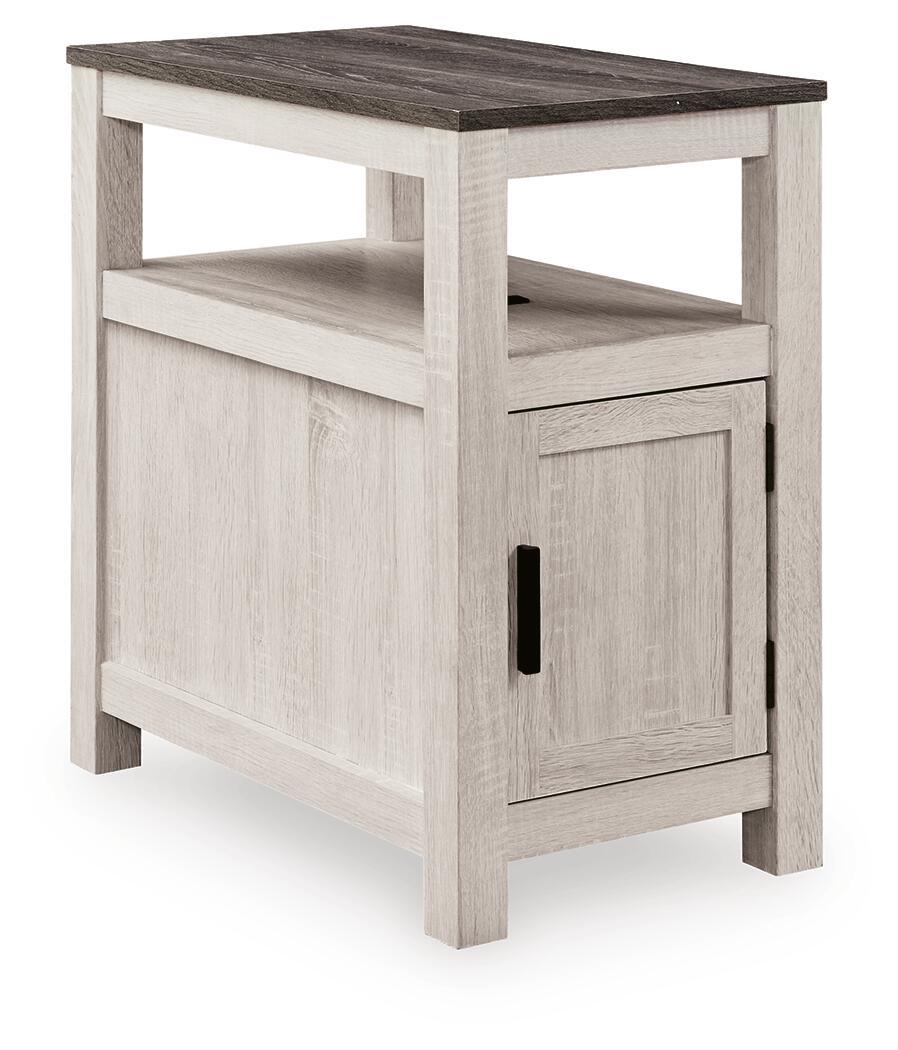 Chair side end table in whitewashed wood with open shelf and cabinet door with black pull