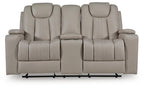 Reclining loveseat with centered backrest and wide padded arms, light beige fabric