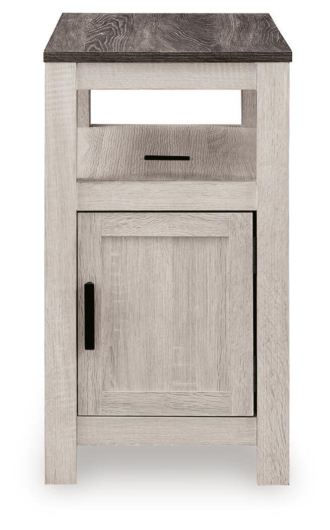 Chair side end table in light whitewashed wood with open shelf and cabinet door with black pull