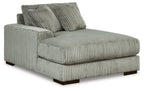 Ribbed upholstered corner chaise with left-facing arm, fog-gray fabric, wide seat