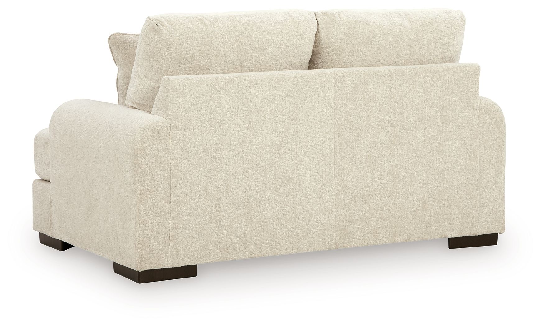Light cream loveseat sofa with two seat cushions, square arms, short dark legs