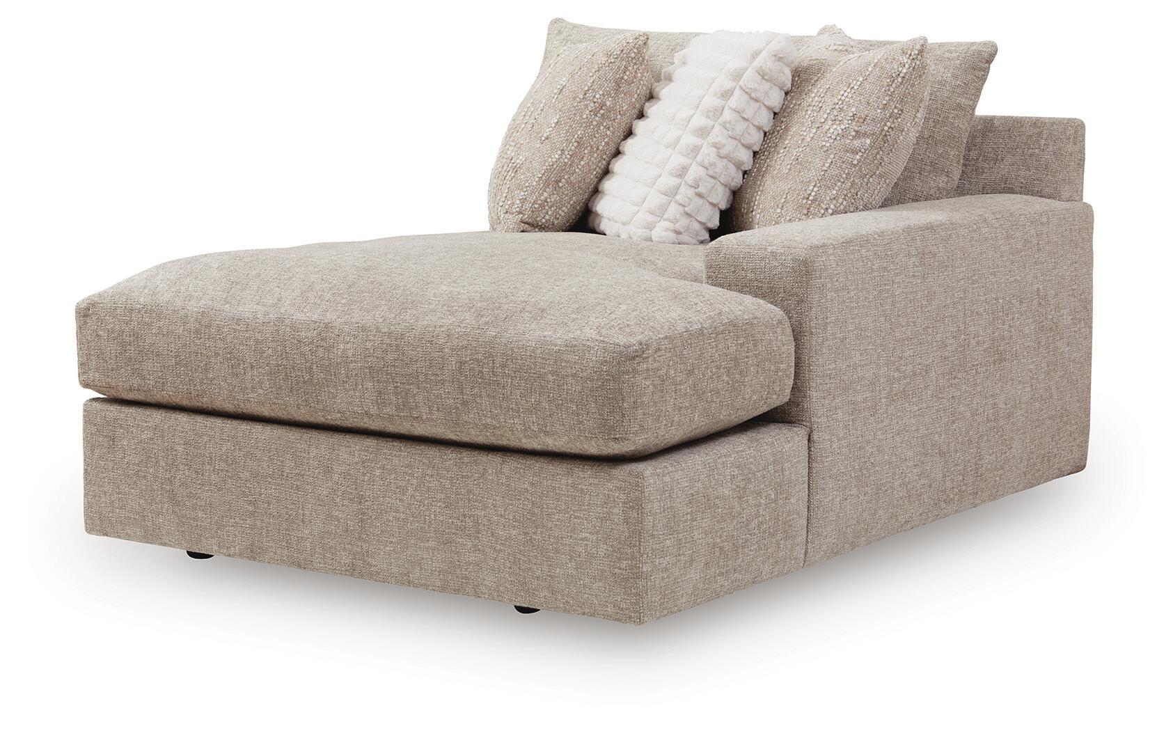Right-facing corner chaise with track arms, padded seat, and two accent pillows