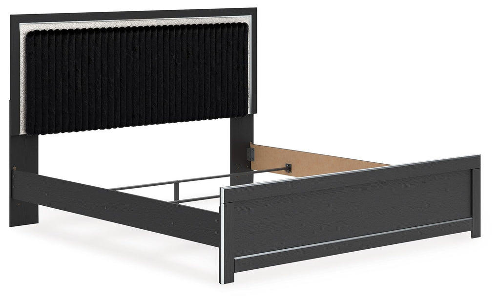 Upholstered panel bed frame with black upholstered headboard paneling and dark side rails