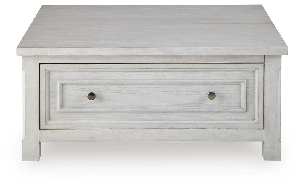 White side table with one long center drawer and two metal knobs.