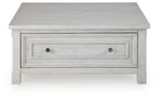 White side table with one long center drawer and two metal knobs.