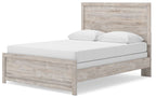 Panel bed frame with light gray weathered wood grain headboard, low footboard