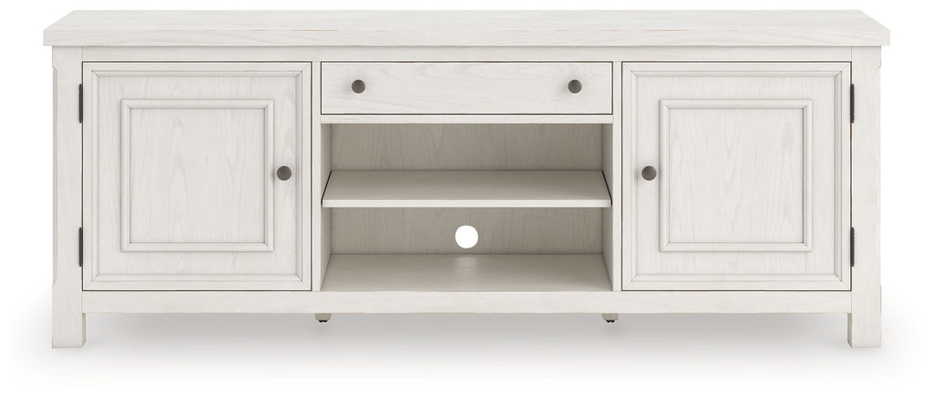 Antique white TV stand with two side cabinets, central open shelves, and drawer