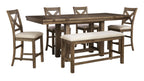 Rectangular dining extension table with grayish brown plank top, benches and chairs