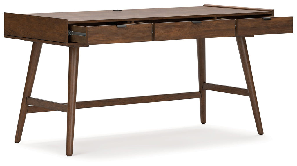 Brown home office desk with two drawers and tapered wooden legs