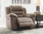 Fossil power recliner with reclining back and ottoman, taupe fabric upholstery