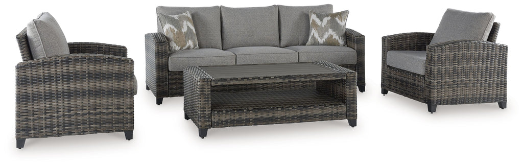 Gray wicker outdoor sofa set with two armchairs and rectangular coffee table