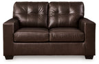 Dark brown leather-look loveseat with tufted back and two padded seat sections, squared arms