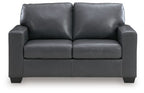 Gray loveseat with squared arms, two back cushions, and padded seat panels