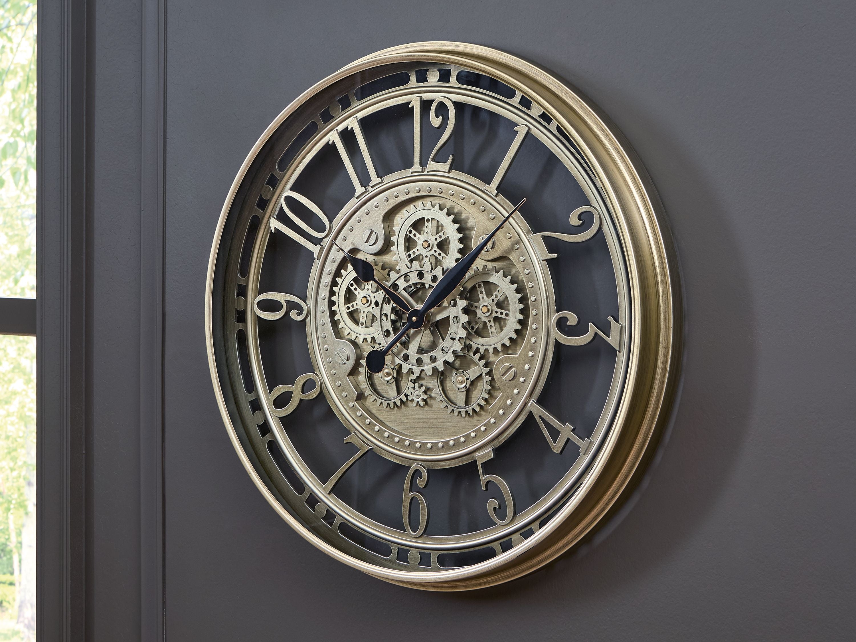 Champagne wall clock with mechanical gear dial and Roman numerals