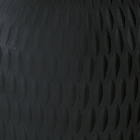 Etney vase close-up, dark gray textured surface with embossed wave pattern