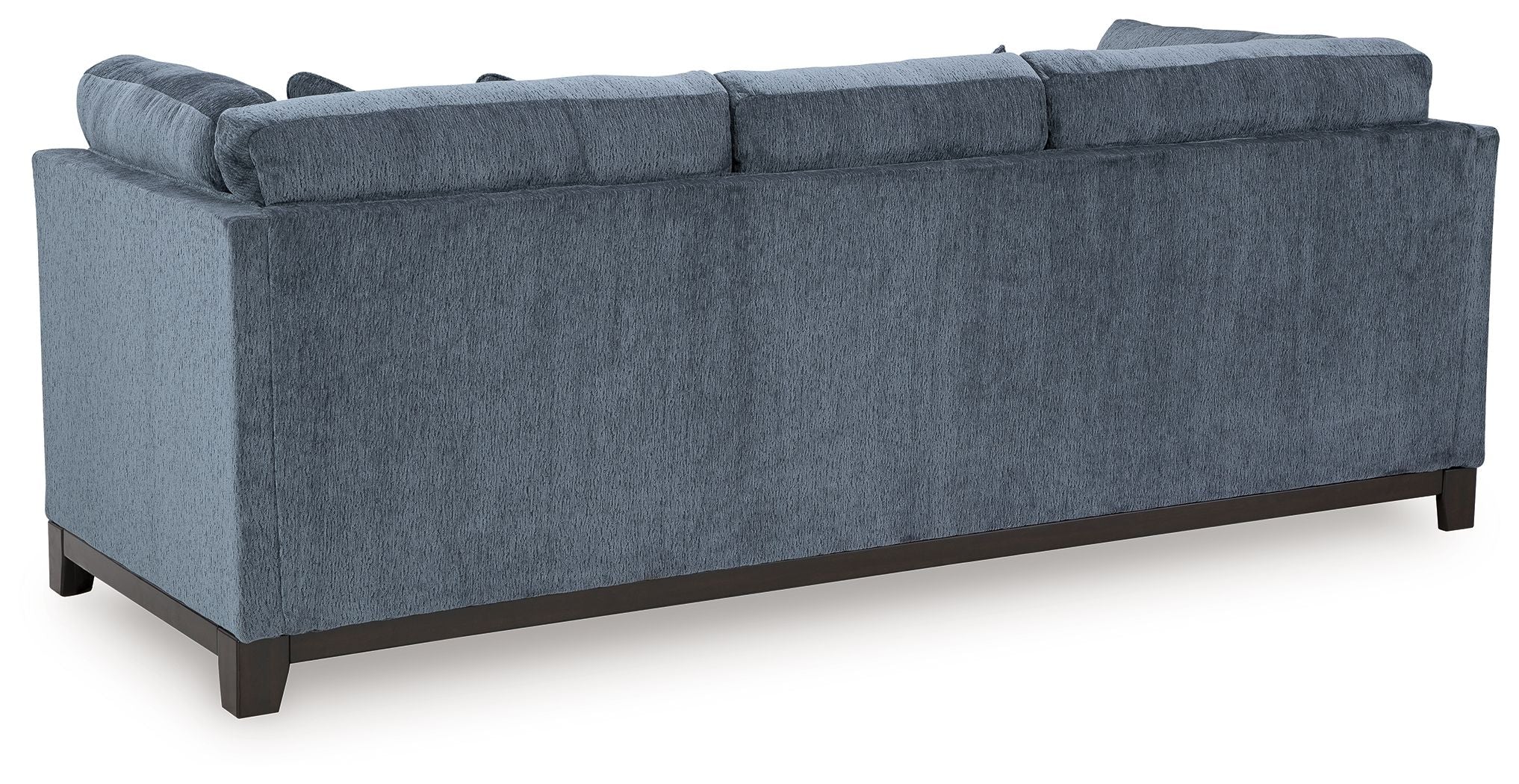 Navy fabric sofa with tufted arms and dark wooden legs