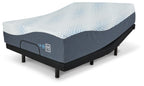 Gel memory foam mattress with white top and dark blue base on black legs