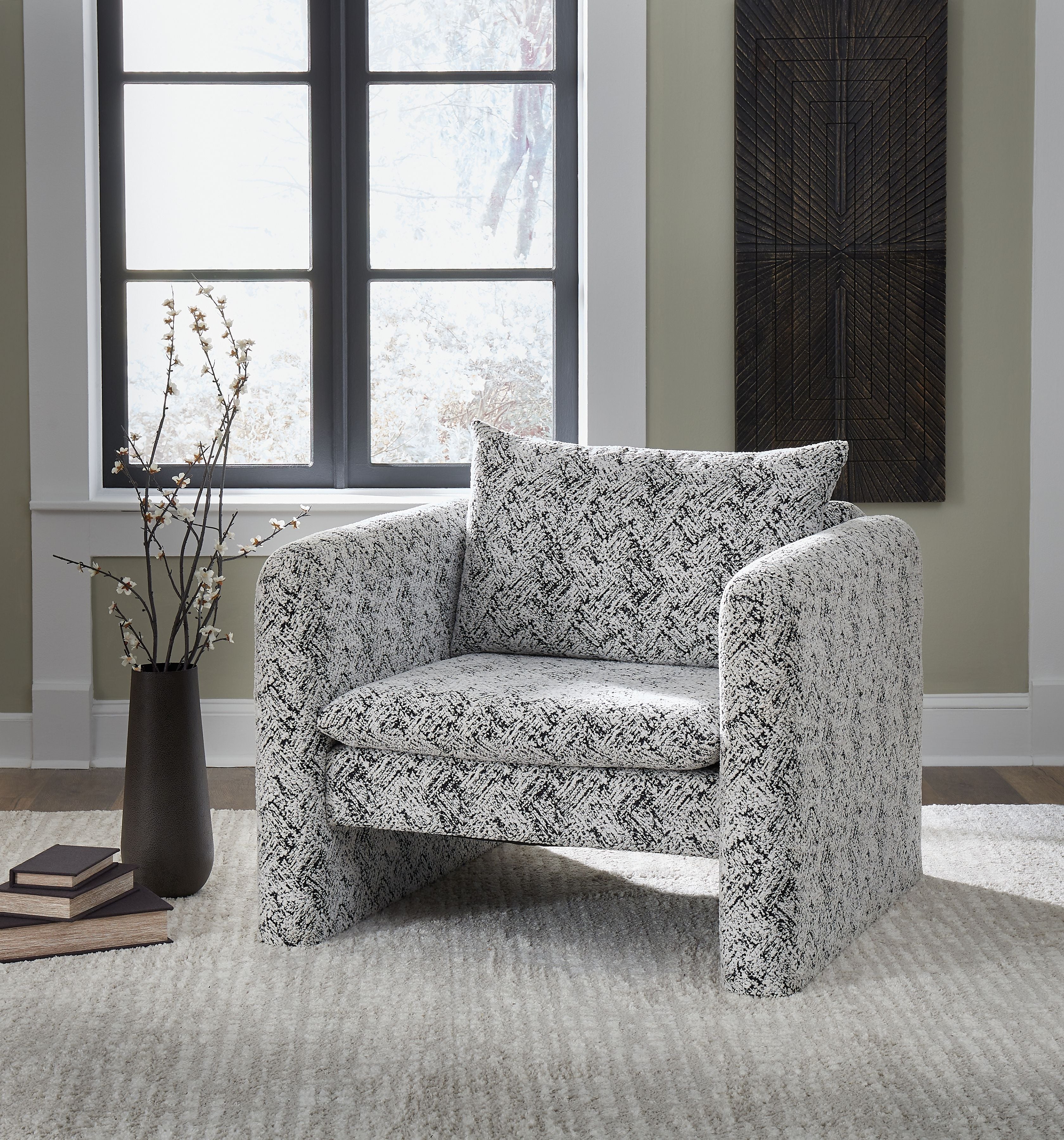 Fabric accent chair with black-and-white speckled woven upholstery and rolled arms