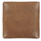 Light brown oversized accent ottoman with flat square back and stitched center seam