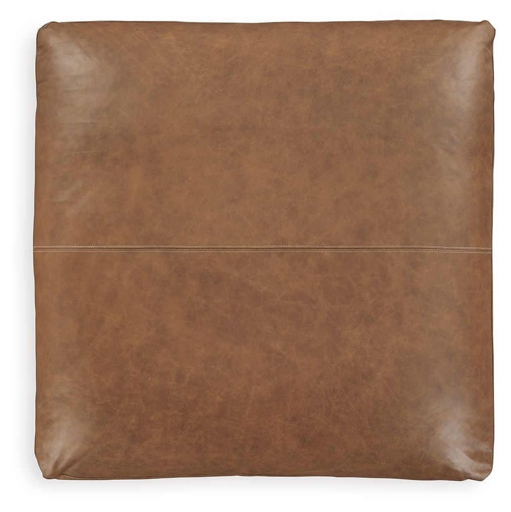 Light brown oversized accent ottoman with flat square back and stitched center seam