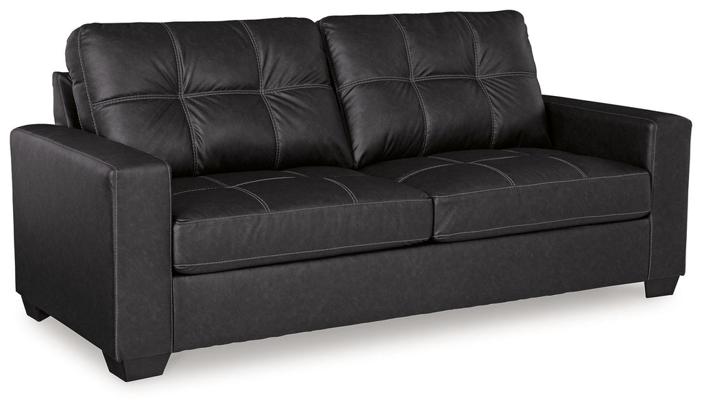 Black sofa sleeper with tufted back and two-seat cushions, track arms, square legs.