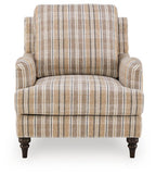 Beige striped accent chair with tall back cushion, padded seat, turned dark legs