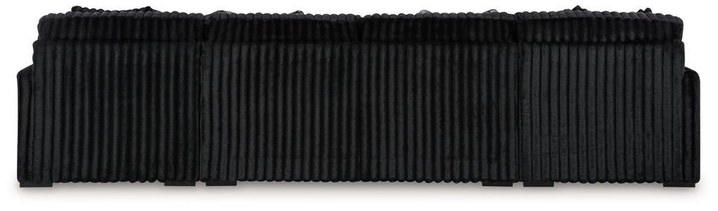 Black corduroy sectional sofa back cushions with scalloped top edge