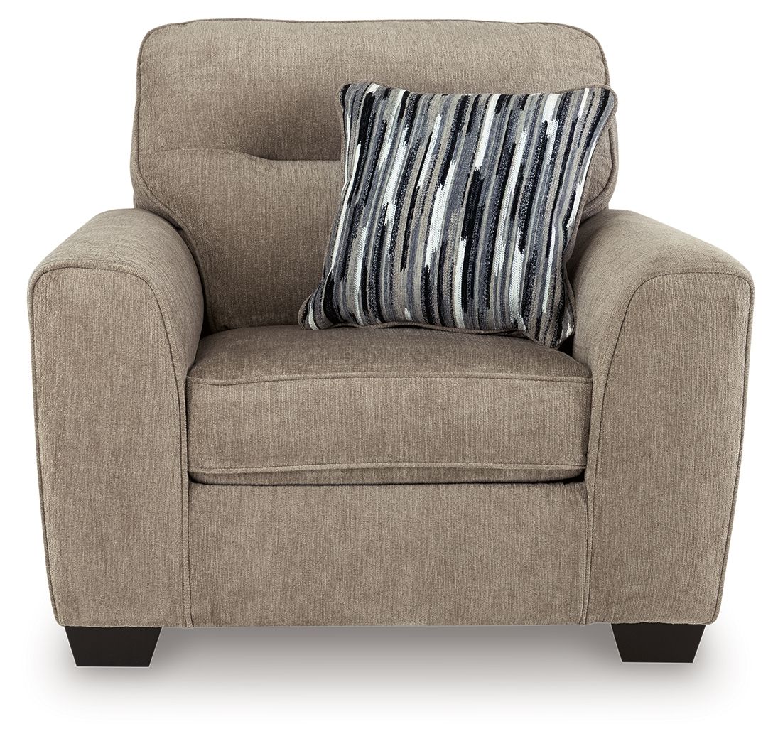 Light brown accent chair with a striped throw pillow centered on the seat
