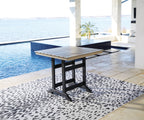Outdoor counter dining set with driftwood slatted table top and dark base