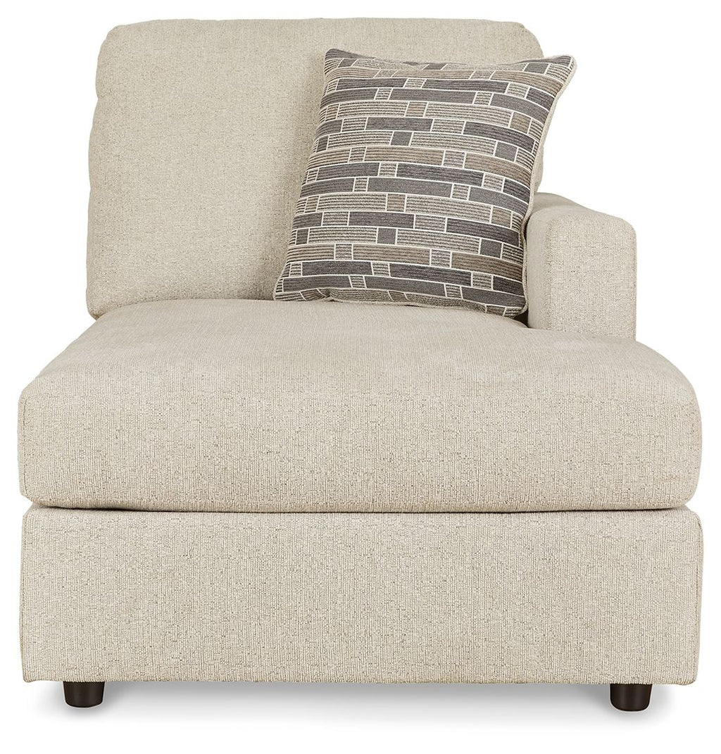 Pearl silver corner chaise with patterned lumbar pillow and upholstered arms
