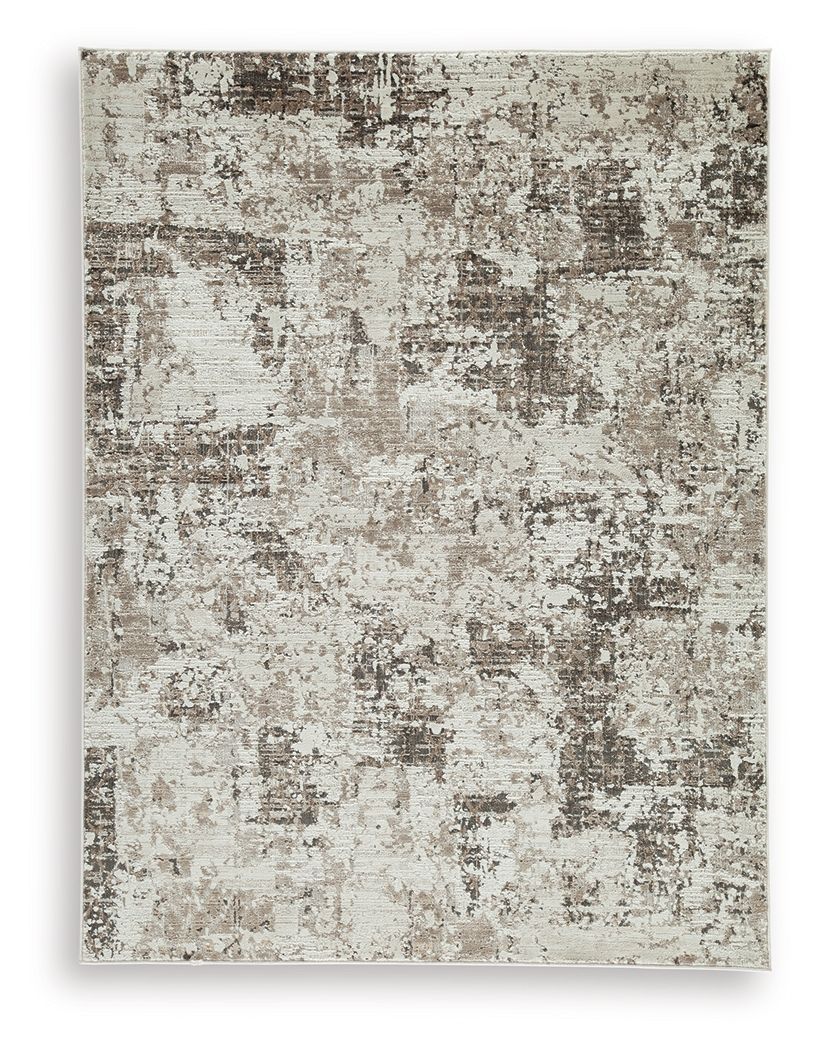 Area rug with distressed gray-and-beige abstract motif and textured surface.