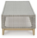 Gray rectangular cocktail table with woven mesh sides and flat tabletop