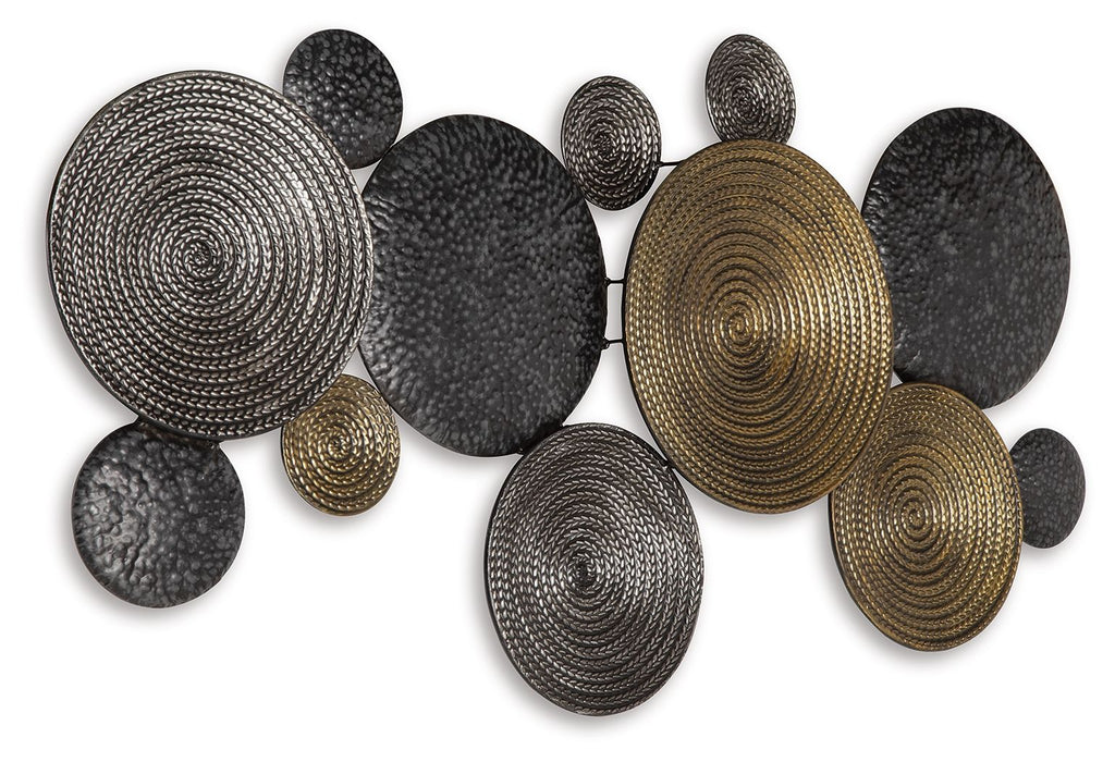 Metallic circular wall decor discs arranged in dark gray, black, and bronze tones.