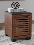 Warm brown chair side end table with black top and slatted drawer front