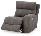 Slate gray fabric power recliner showing reclining back and extended footrest, front angle.