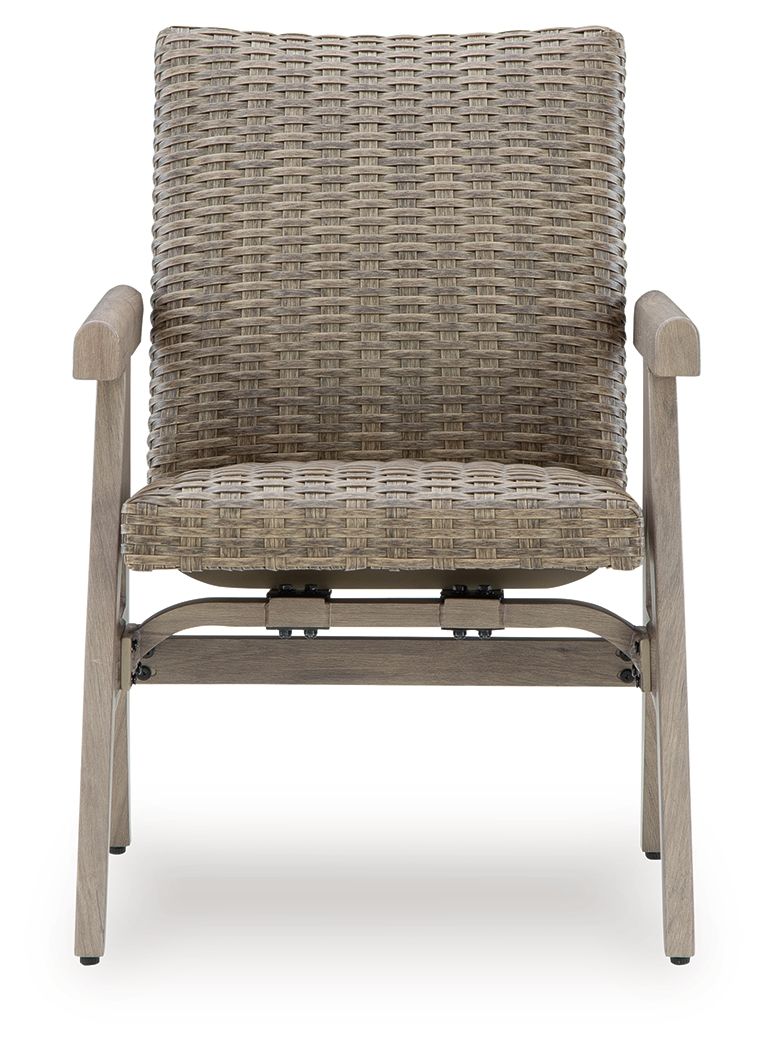 Rocking arm chair with woven beige back and seat, light wood arms and legs